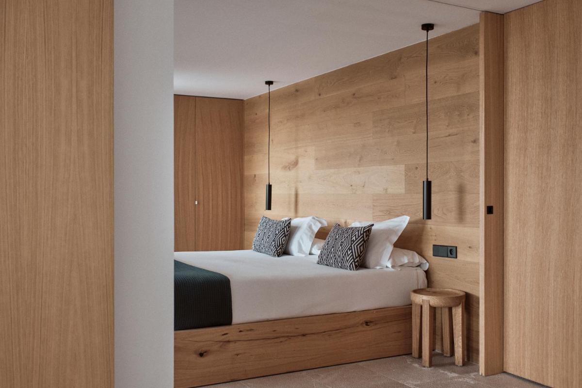 Cama o camas de una habitación en Las Gaviotas Suites Hotel & Spa