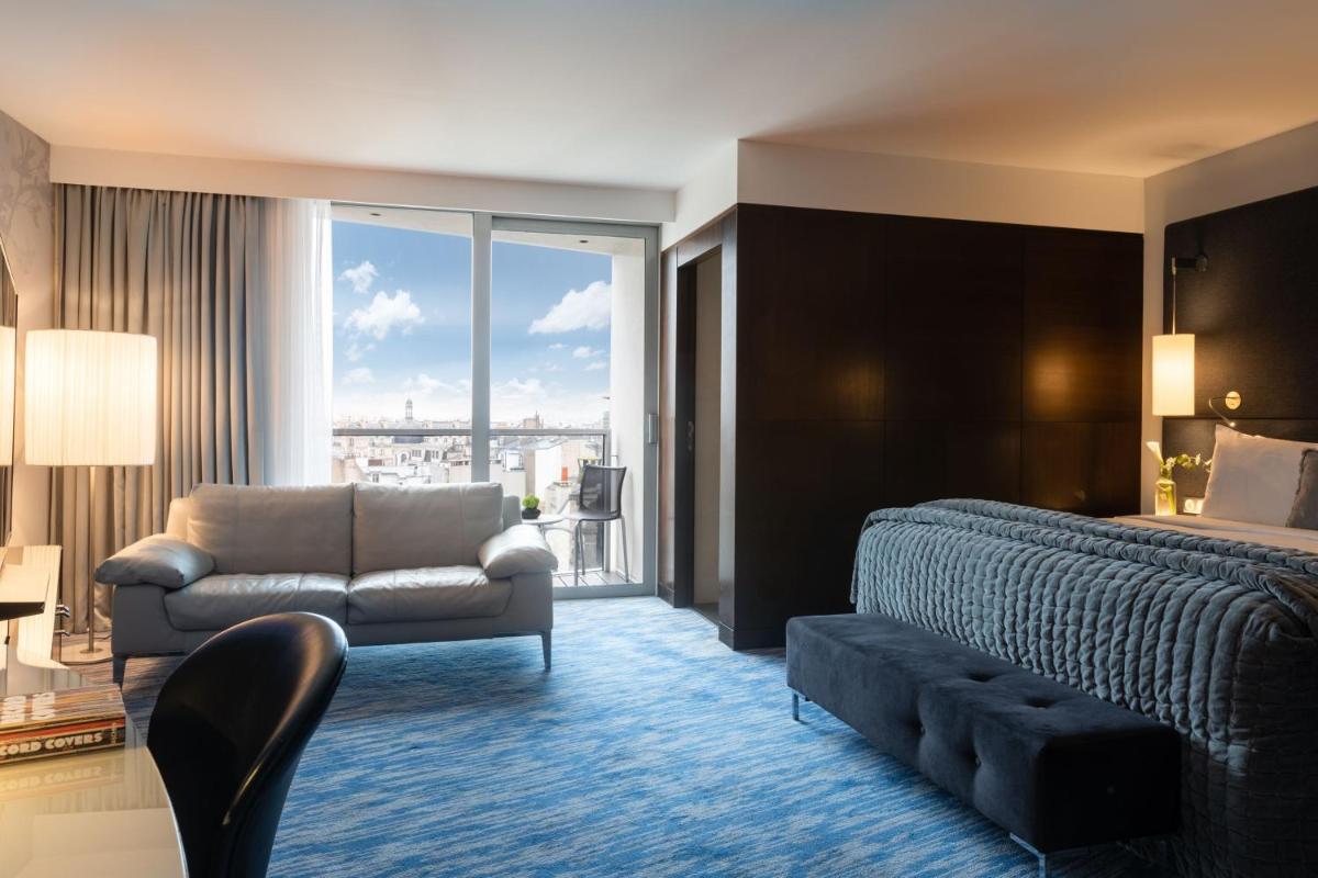 Coin salon dans l'établissement Renaissance Paris Arc de Triomphe Hotel