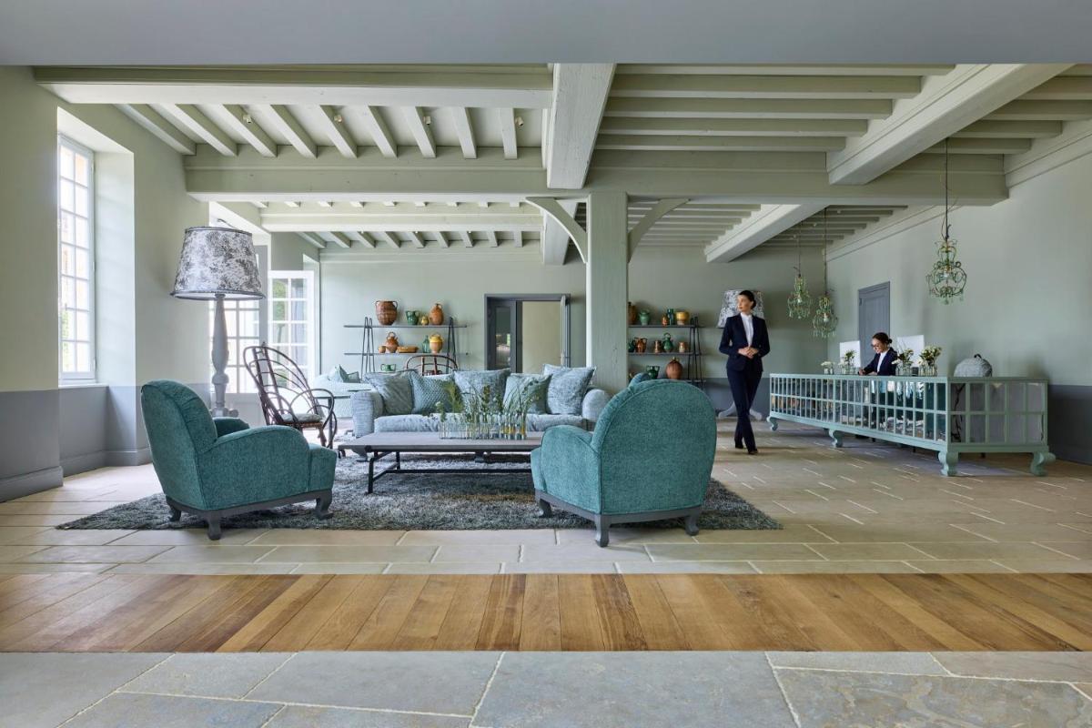 Coin salon dans l'établissement COMO Le Montrachet