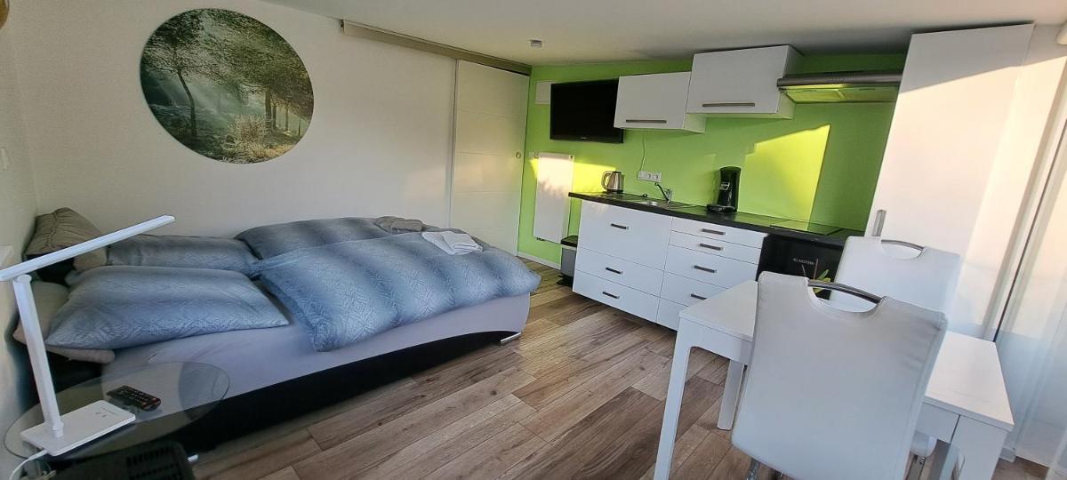 All-in-One Apartment mit eigener Sonnenterrasse im Garten - Housity