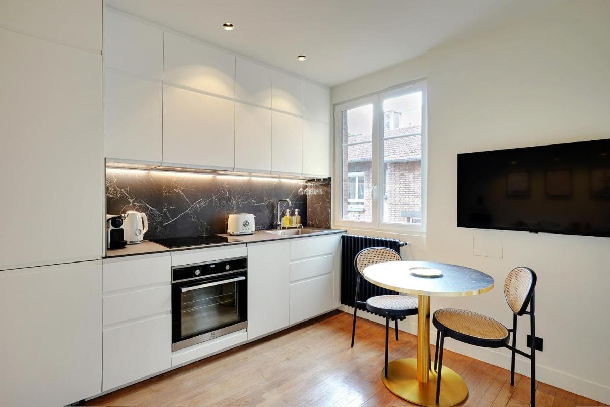 Suitetrails - Charming Apartment by Les Maisons de Charloc Homes