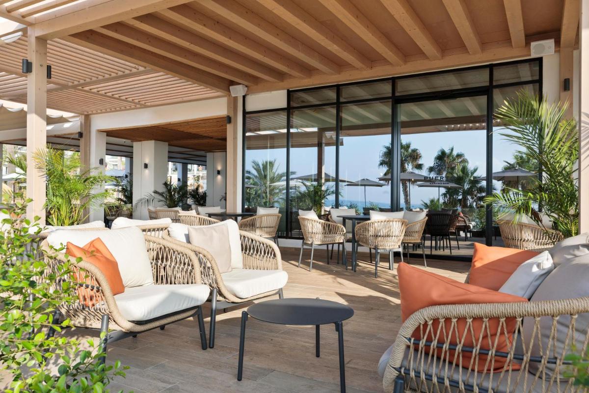 Zona de estar de Hotel Best Triton