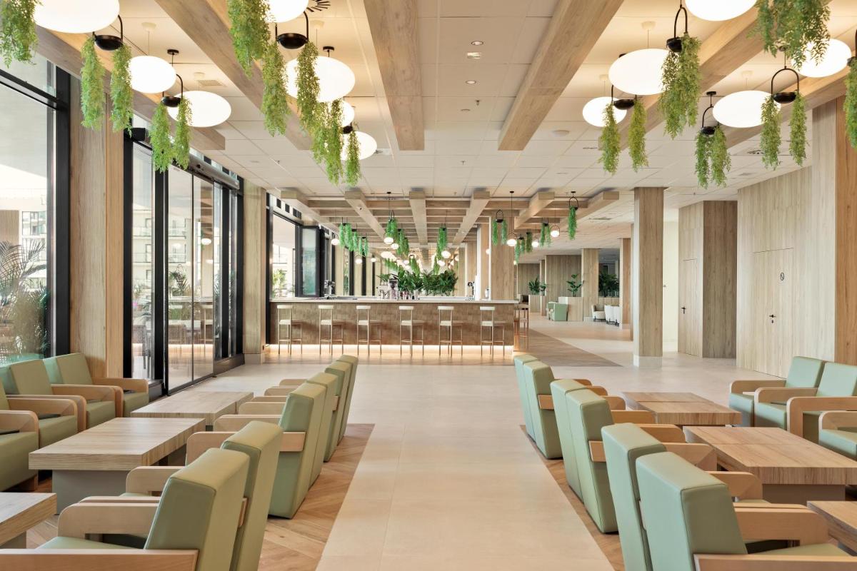 Zona de estar de Hotel Best Triton