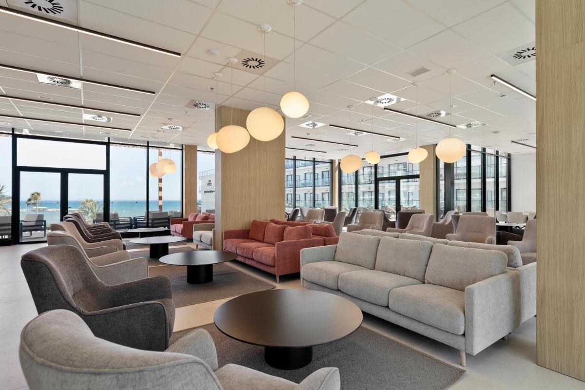 Zona de estar de Hotel Best Triton