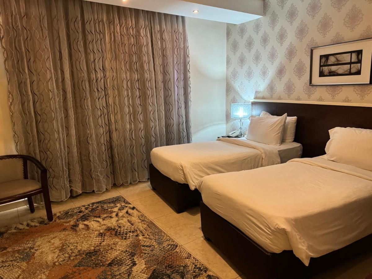 City Rose Hotel Suites - Housity