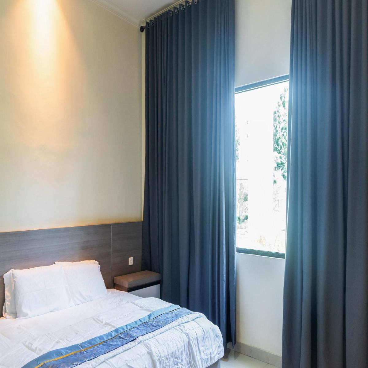 Suitetrails - Mitra Hotel Muaro Bungo Mitra RedDoorz