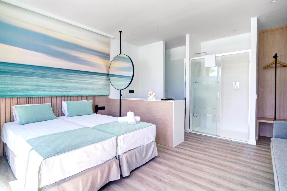 Cama o camas de una habitación en Alannia Salou
