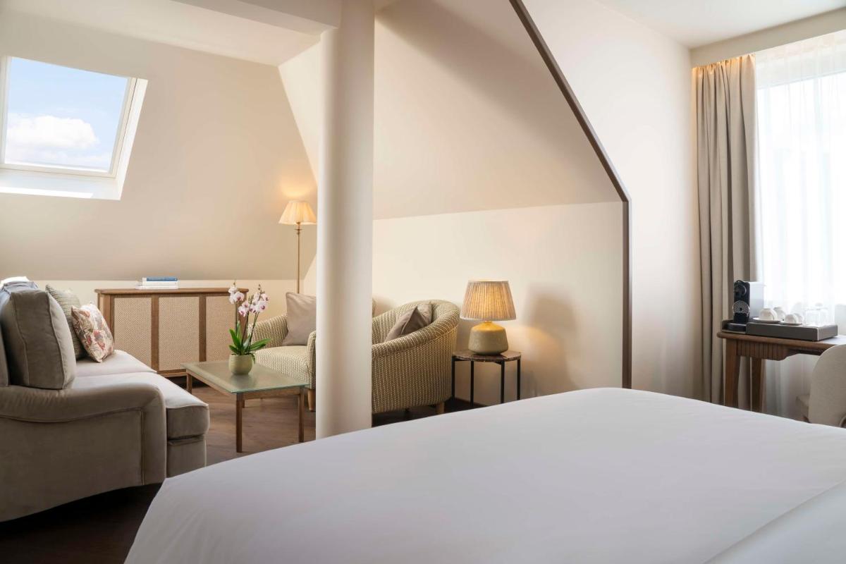 Ein Bett oder Betten in einem Zimmer der Unterkunft Brunfels Hotel, in the Unbound Collection by Hyatt