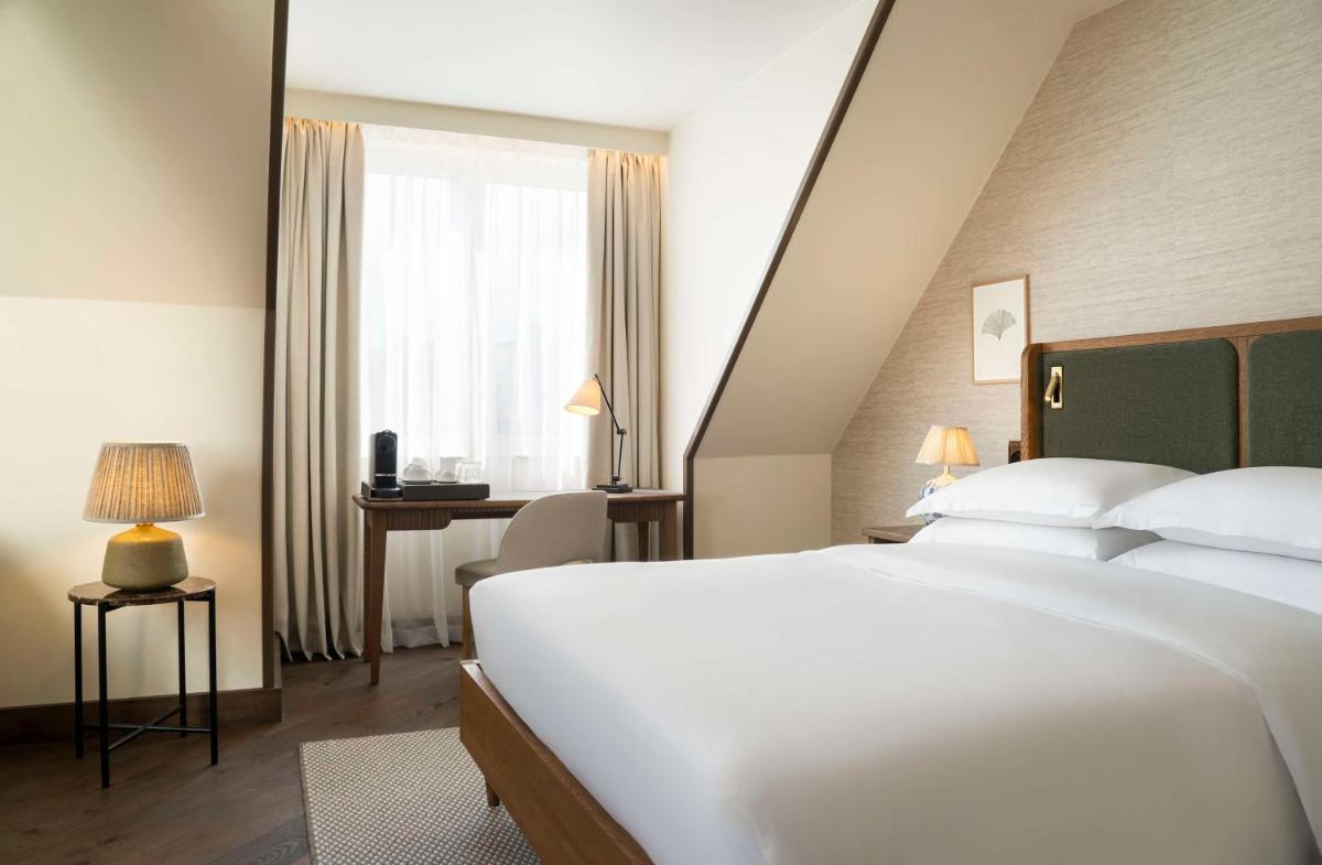Ein Bett oder Betten in einem Zimmer der Unterkunft Brunfels Hotel, in the Unbound Collection by Hyatt