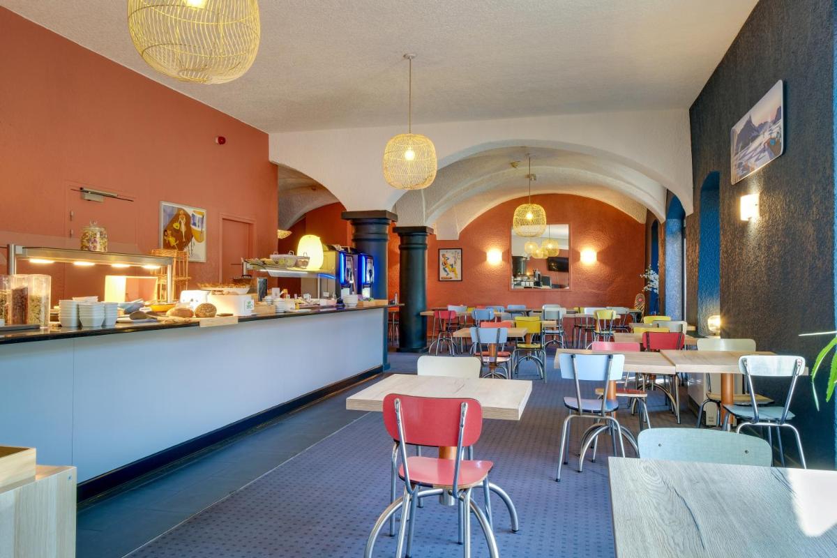 Restaurant ou autre lieu de restauration dans l'établissement Sure Hotel by Best Western Annecy