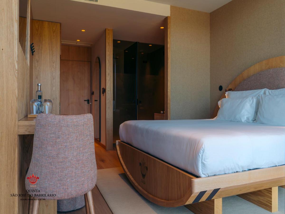 Uma cama ou camas num quarto em Barrilario Douro Wine Hotel e Spa - Quinta São Jose do Barrilario