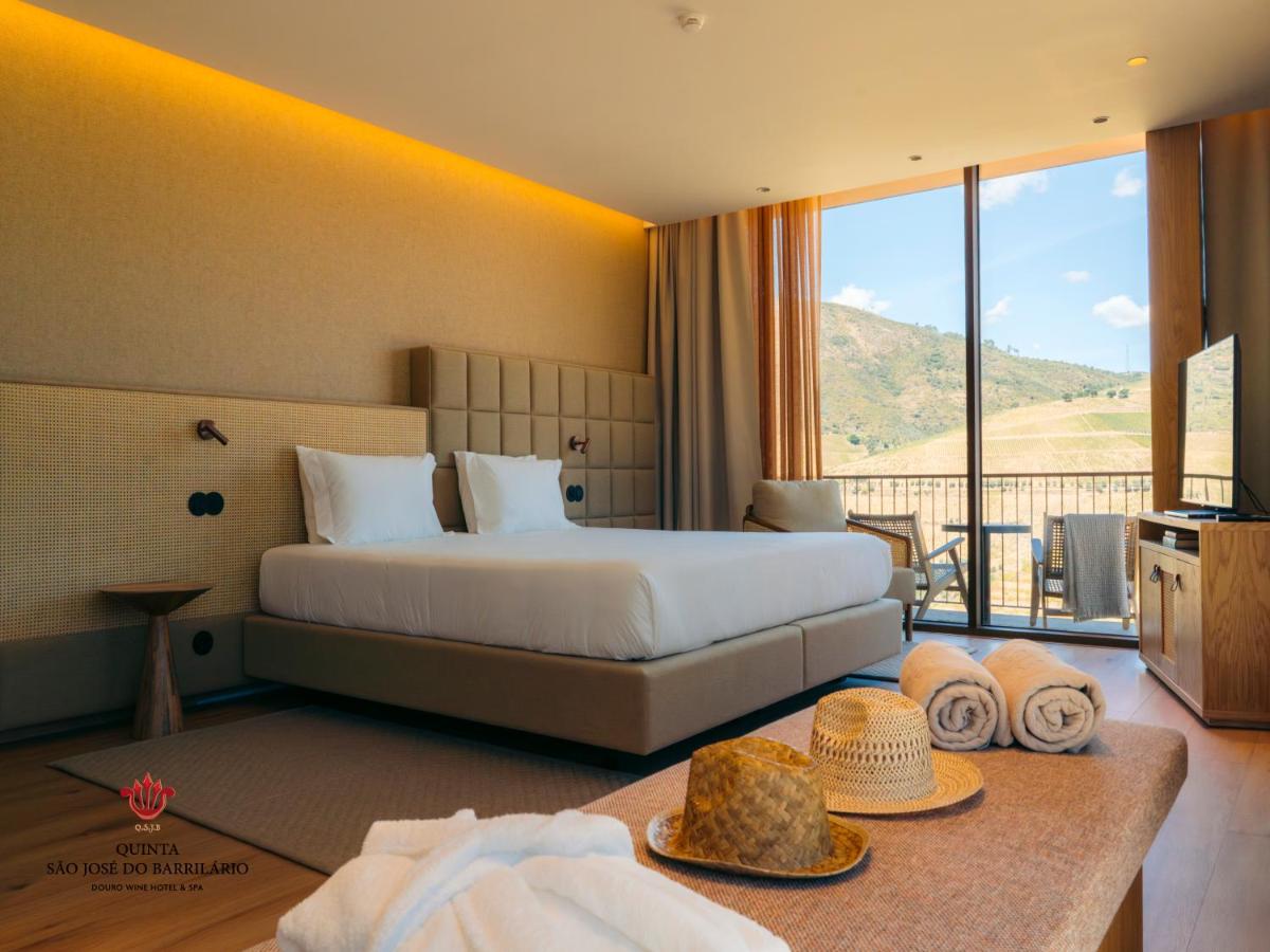 Uma cama ou camas num quarto em Barrilario Douro Wine Hotel e Spa - Quinta São Jose do Barrilario