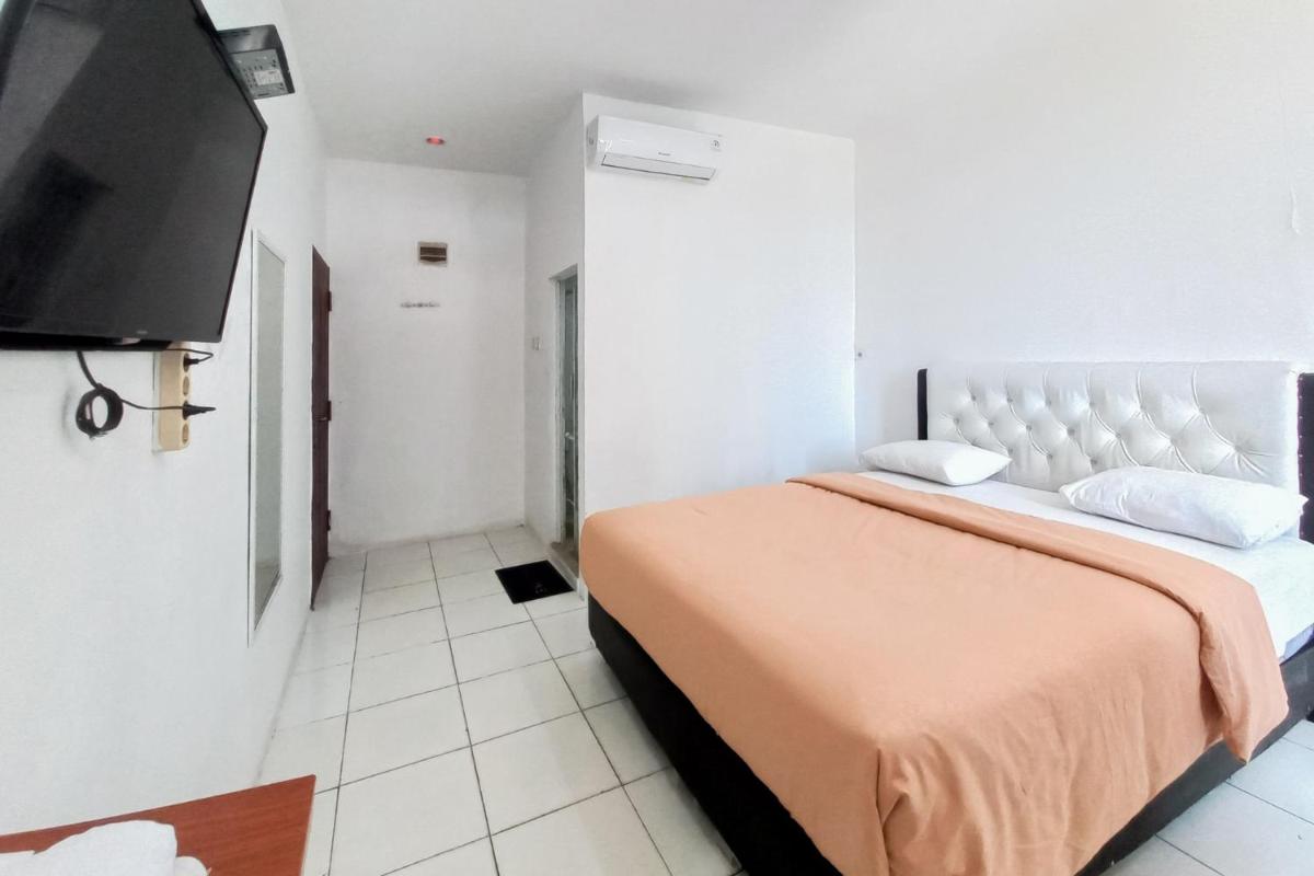 JOY GuestHouse Pekanbaru Mitra RedDoorz - Housity