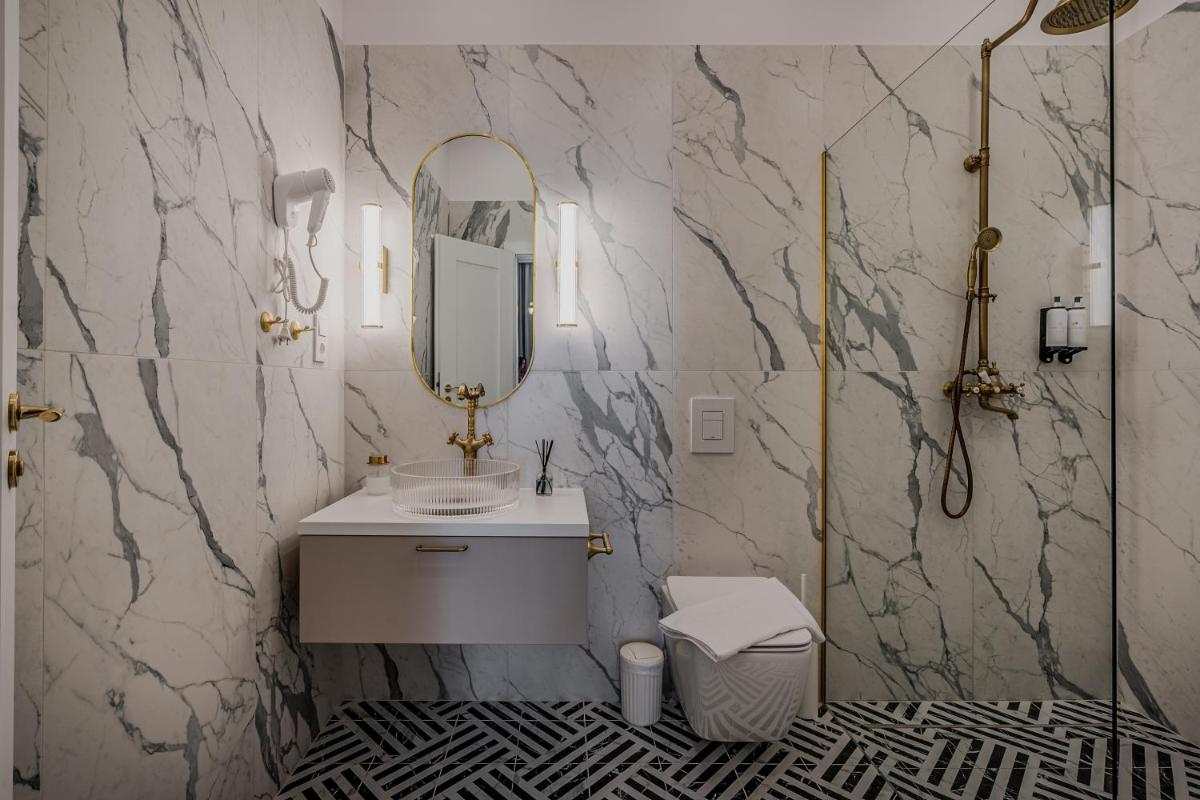 Timeless Boutique Suites by BQA - Housity