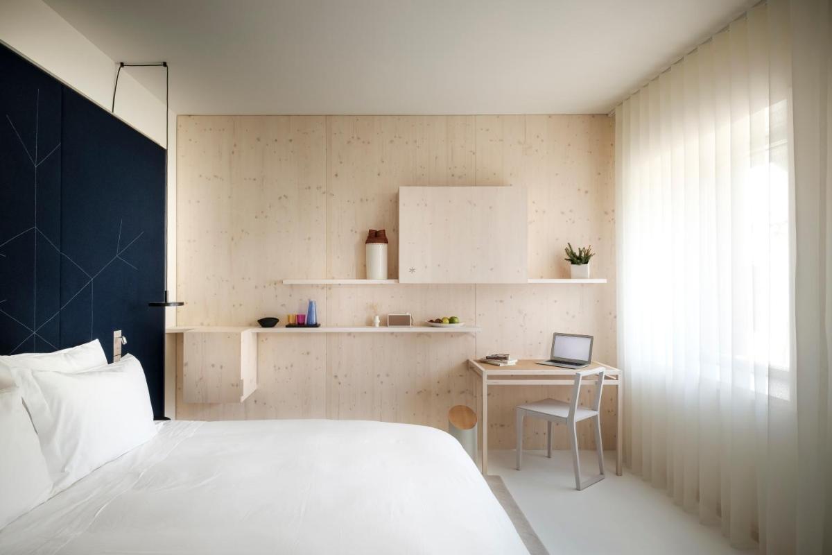 Uma cama ou camas num quarto em Casa de São Lourenço - Burel Panorama Hotel - member of Design Hotels