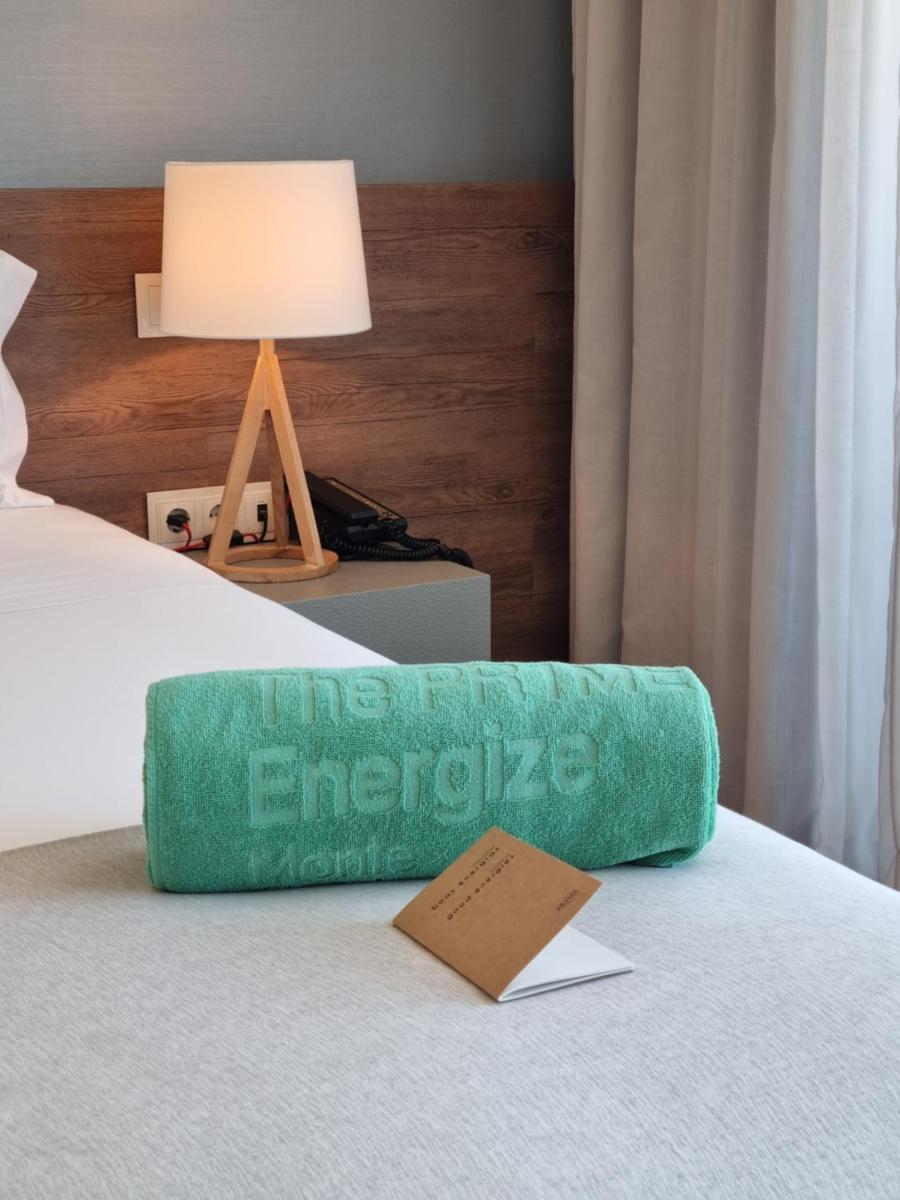 Uma cama ou camas num quarto em The Prime Energize Hotel & SPA - Algarve