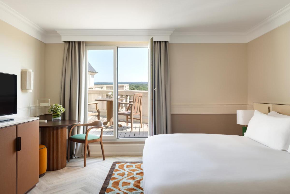 Un ou plusieurs lits dans un hébergement de l'établissement InterContinental Hotels Chantilly Chateau Mont Royal by IHG Un ou plusieurs lits dans un hébergement de l'établissement InterContinental Hotels Chantilly Chateau Mont Royal by IHG