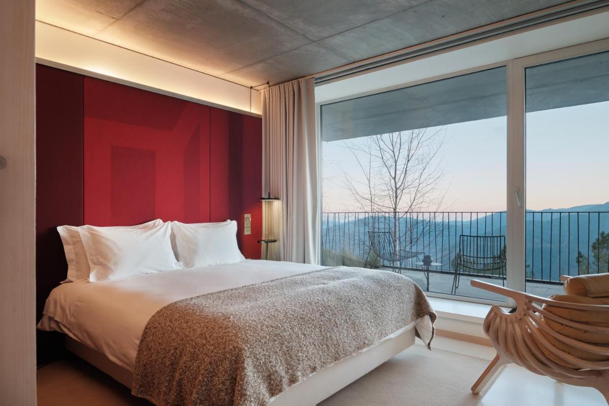 Uma cama ou camas num quarto em Casa de São Lourenço - Burel Panorama Hotel - member of Design Hotels