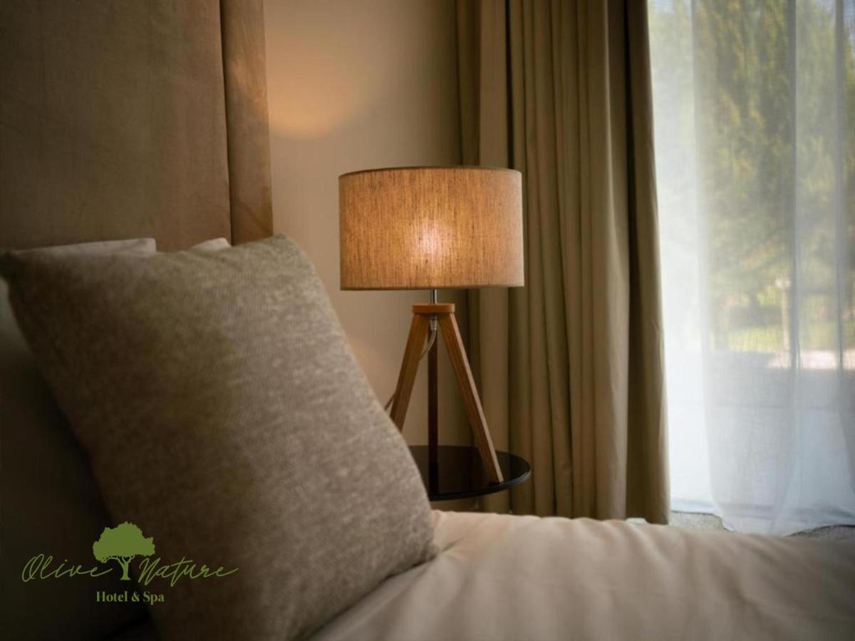 Uma cama ou camas num quarto em Olive Nature Hotel & SPA - Quinta Valle de Passos