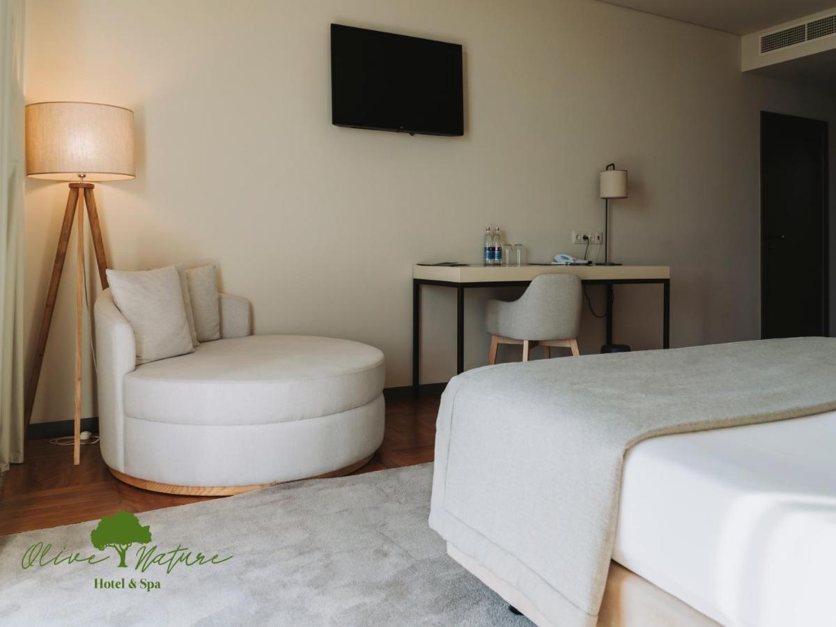 Uma cama ou camas num quarto em Olive Nature Hotel & SPA - Quinta Valle de Passos