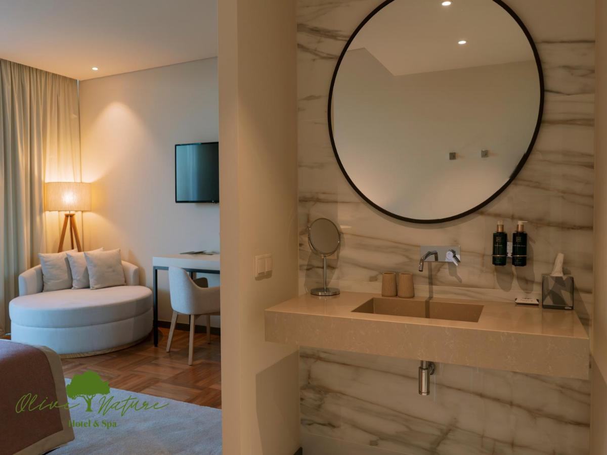 Uma cama ou camas num quarto em Olive Nature Hotel & SPA - Quinta Valle de Passos