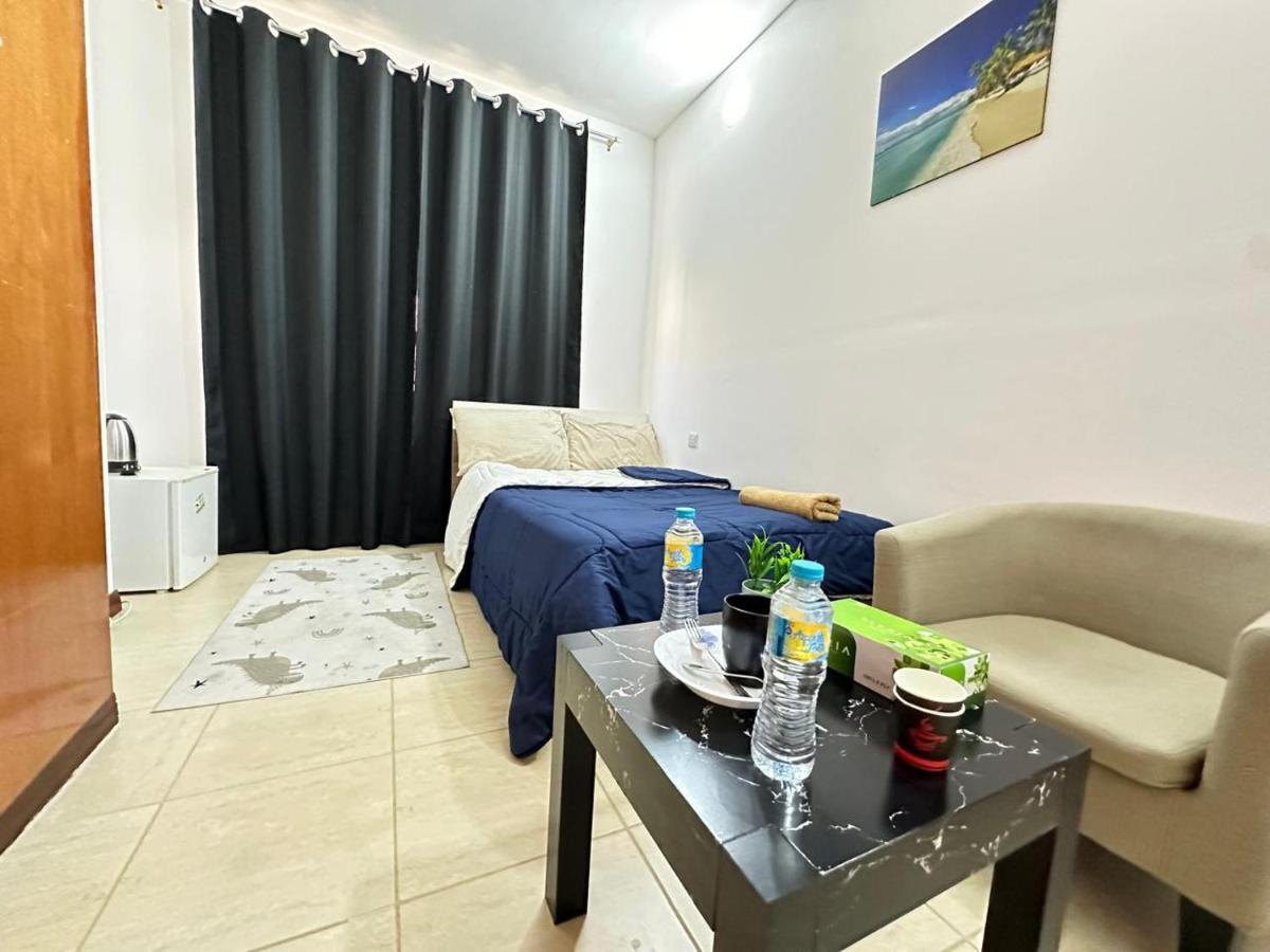 Heart of Abu Dhabi - Luxury Room - Housity