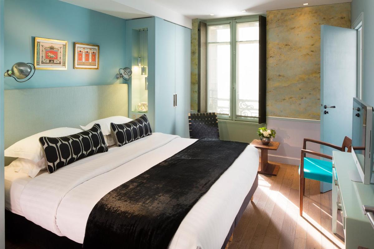 Un ou plusieurs lits dans un hébergement de l'établissement Hotel & Spa La Belle Juliette