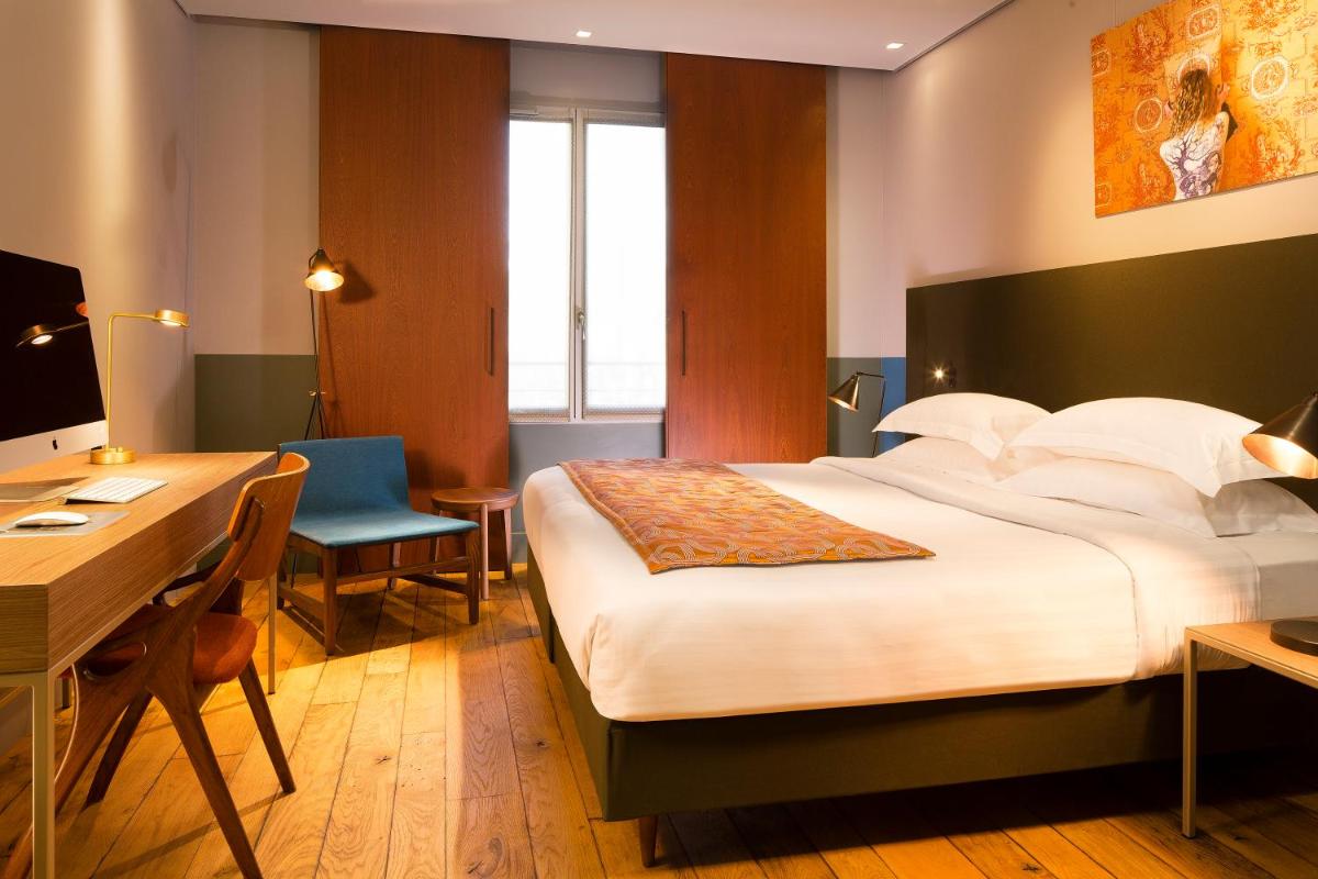 Un ou plusieurs lits dans un hébergement de l'établissement Hotel & Spa La Belle Juliette