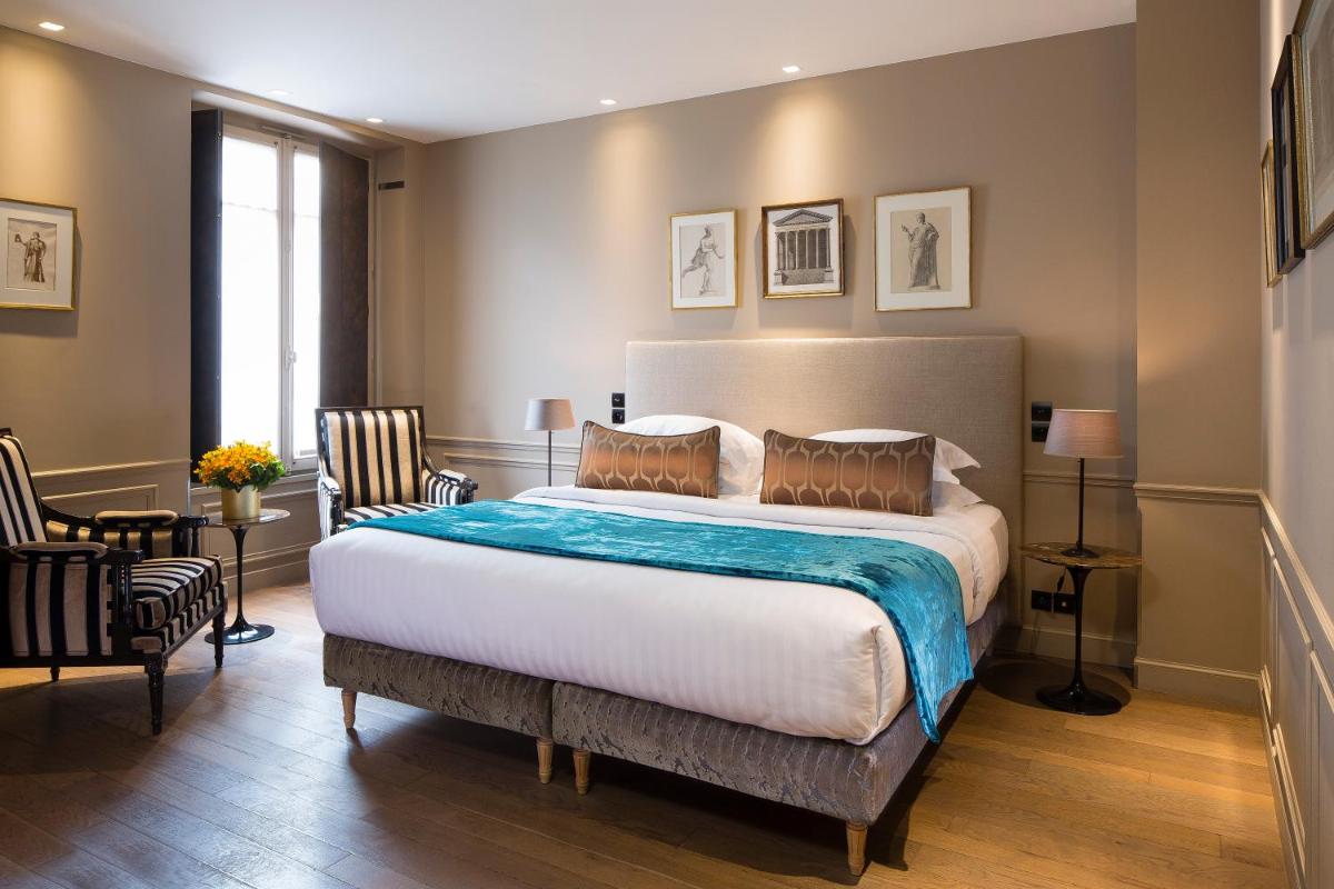 Un ou plusieurs lits dans un hébergement de l'établissement Hotel & Spa La Belle Juliette