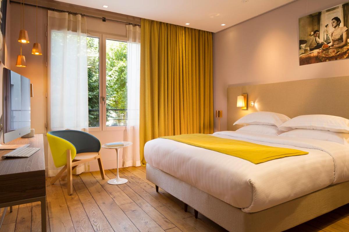Un ou plusieurs lits dans un hébergement de l'établissement Hotel & Spa La Belle Juliette