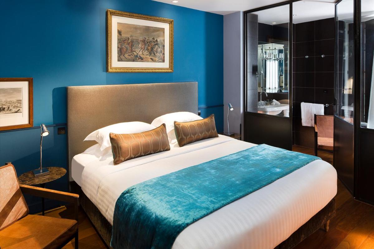 Un ou plusieurs lits dans un hébergement de l'établissement Hotel & Spa La Belle Juliette