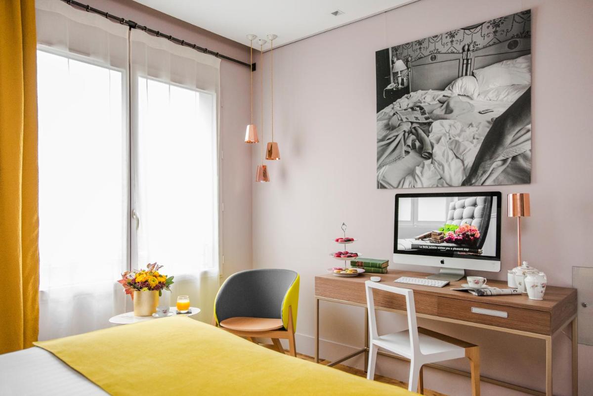 Télévision ou salle de divertissement dans l'établissement Hotel & Spa La Belle Juliette