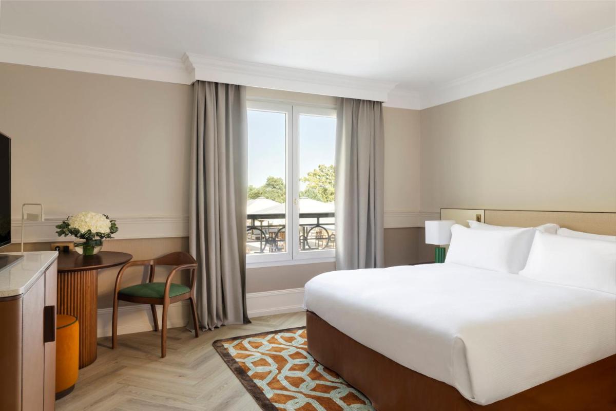 Un ou plusieurs lits dans un hébergement de l'établissement InterContinental Hotels Chantilly Chateau Mont Royal by IHG
