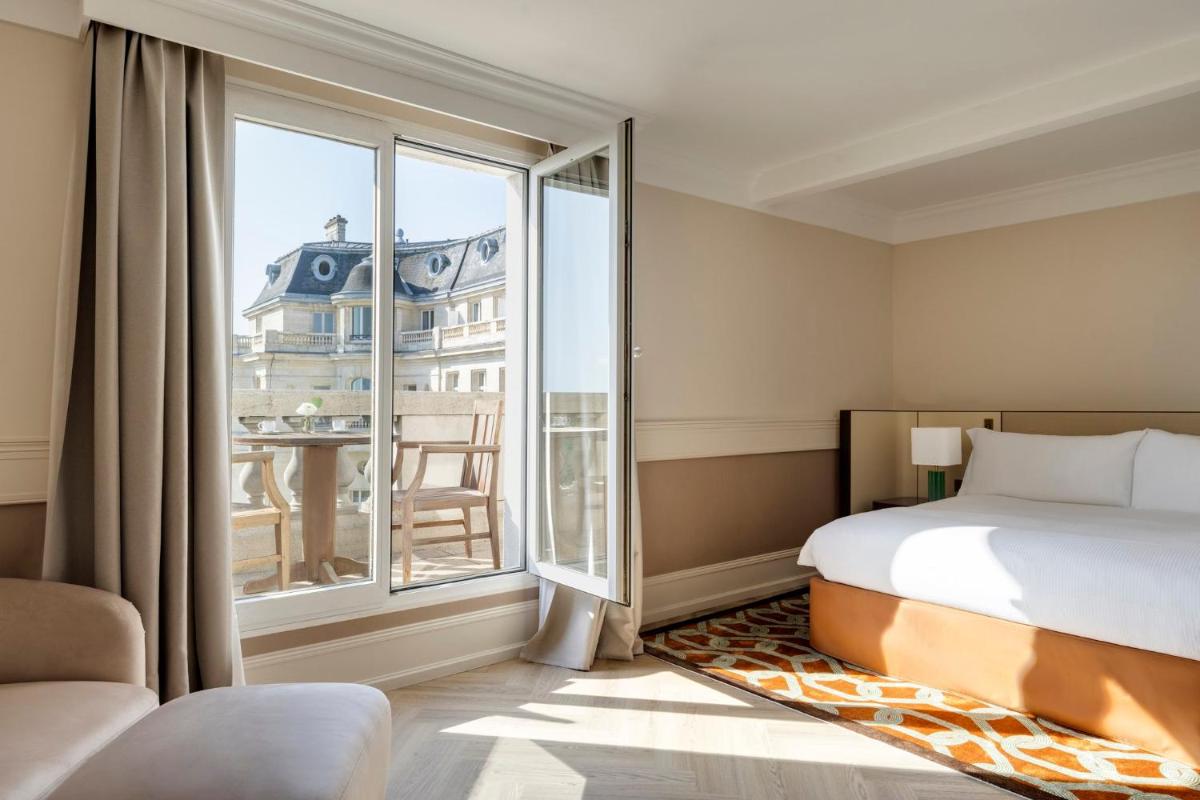 Un ou plusieurs lits dans un hébergement de l'établissement InterContinental Hotels Chantilly Chateau Mont Royal by IHG
