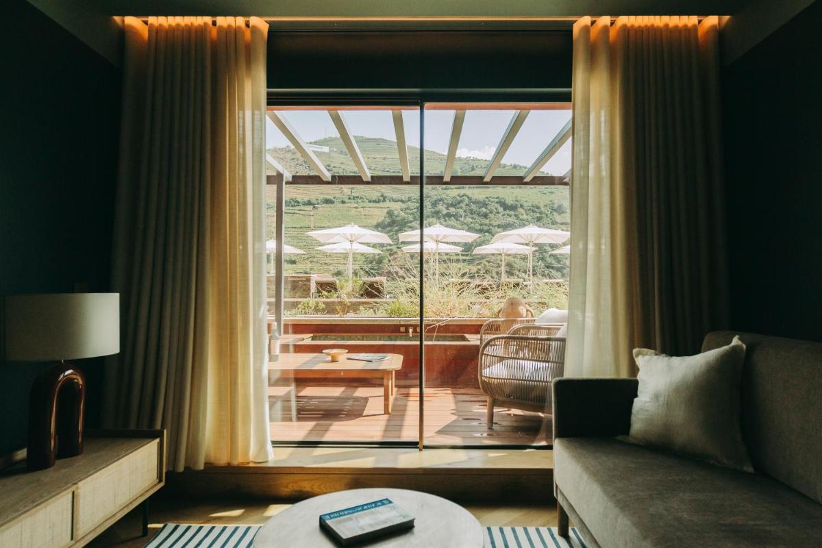 Uma área de estar em Torel Quinta da Vacaria - Douro Valley