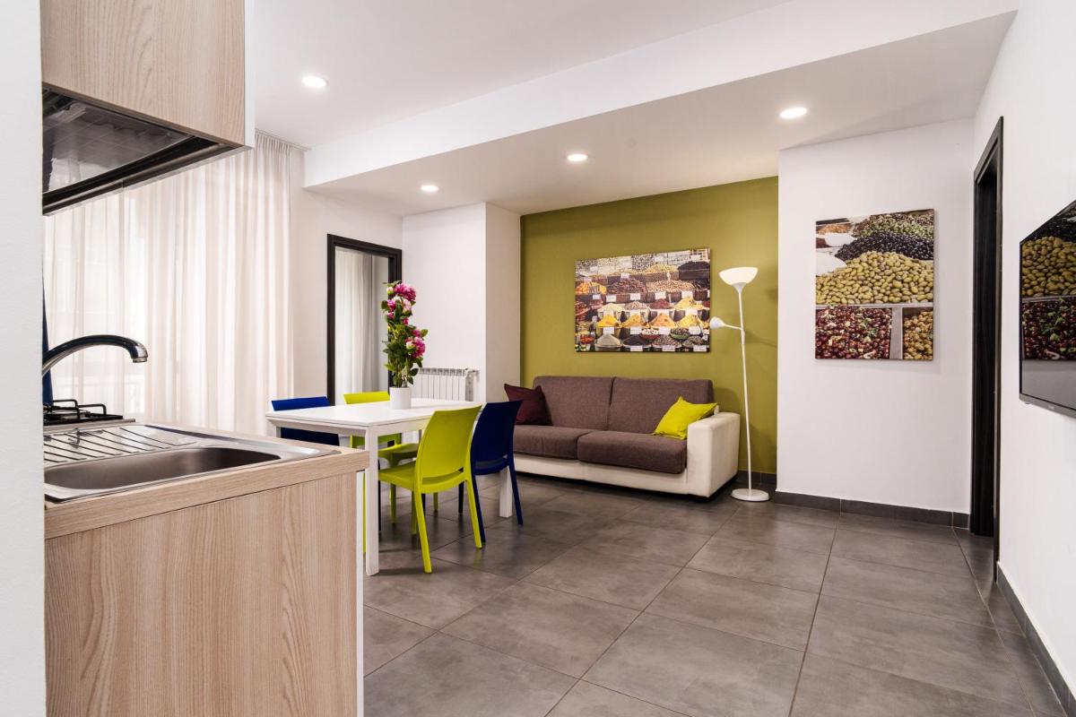 Residence Palazzo dei Delfini by RECEPTIO - Housity