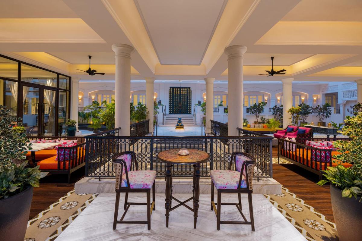 a view of the lobby of the resort with a table and chairs at Pilibhit House, Haridwar – IHCL SeleQtions in Haridwār