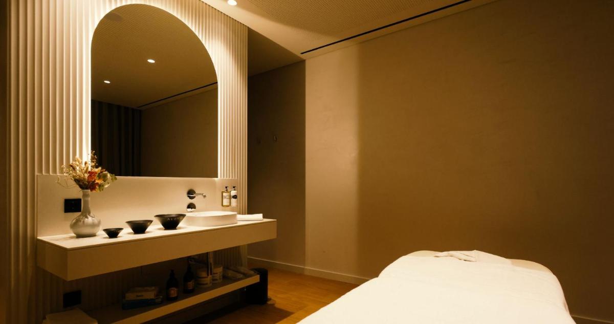Uma cama ou camas num quarto em Montebelo Viseu Congress Hotel & Spa