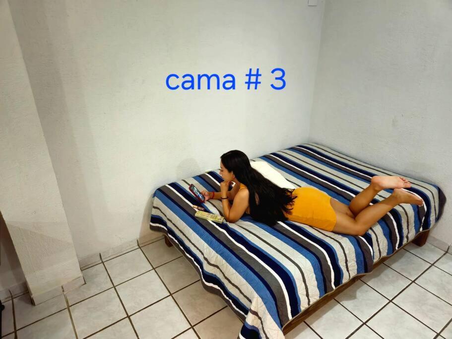 Habitacion tipo hotel centrico 3 camas, cocina,WIFI E - Housity