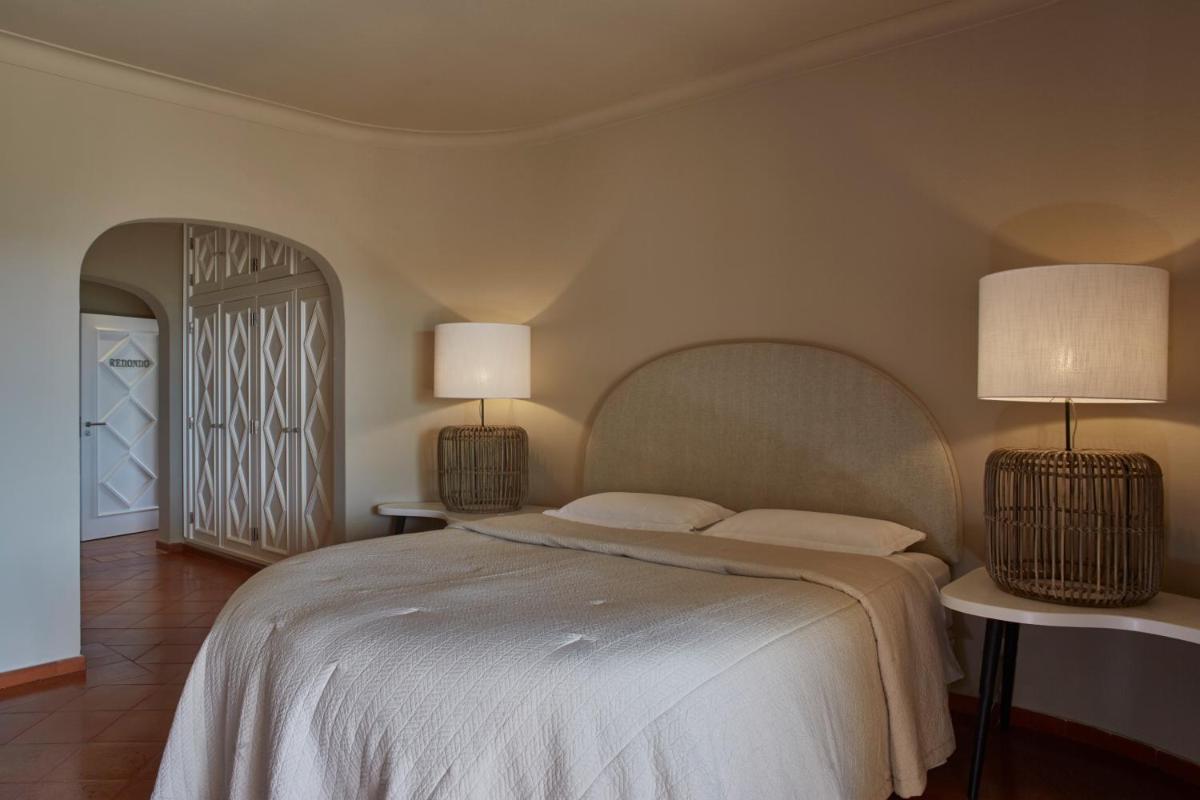 Uma cama ou camas num quarto em Vila Joya