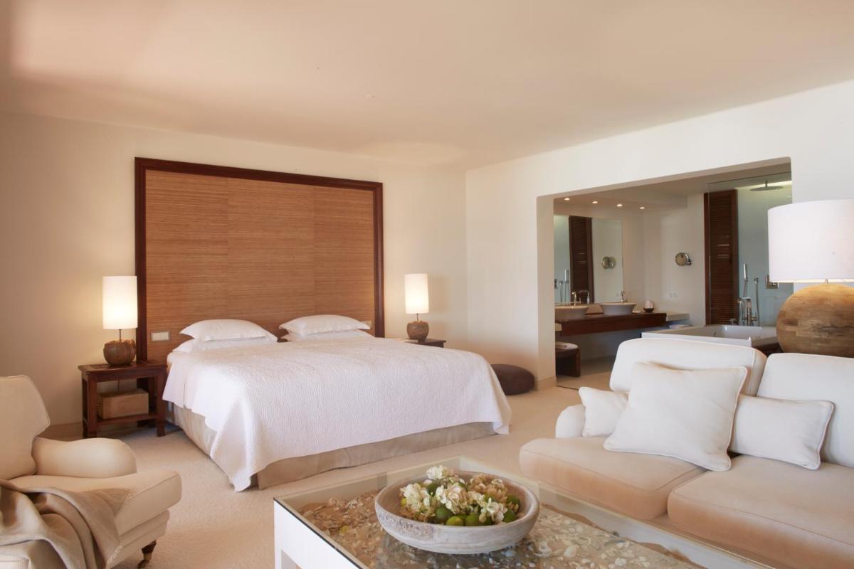 Uma cama ou camas num quarto em Vila Joya