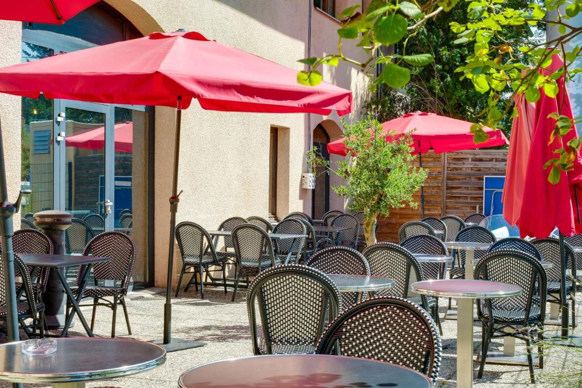 Restaurant ou autre lieu de restauration dans l'établissement Sure Hotel by Best Western Annecy