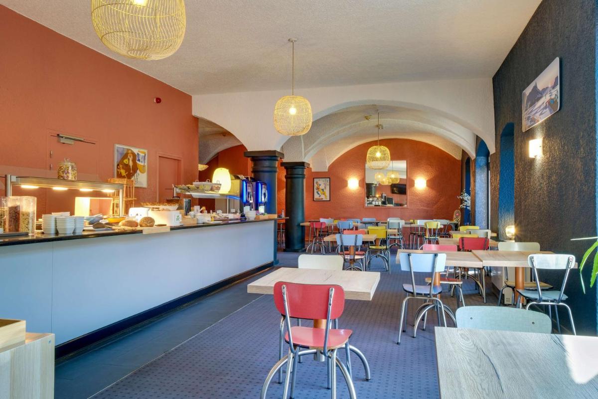 Restaurant ou autre lieu de restauration dans l'établissement Sure Hotel by Best Western Annecy