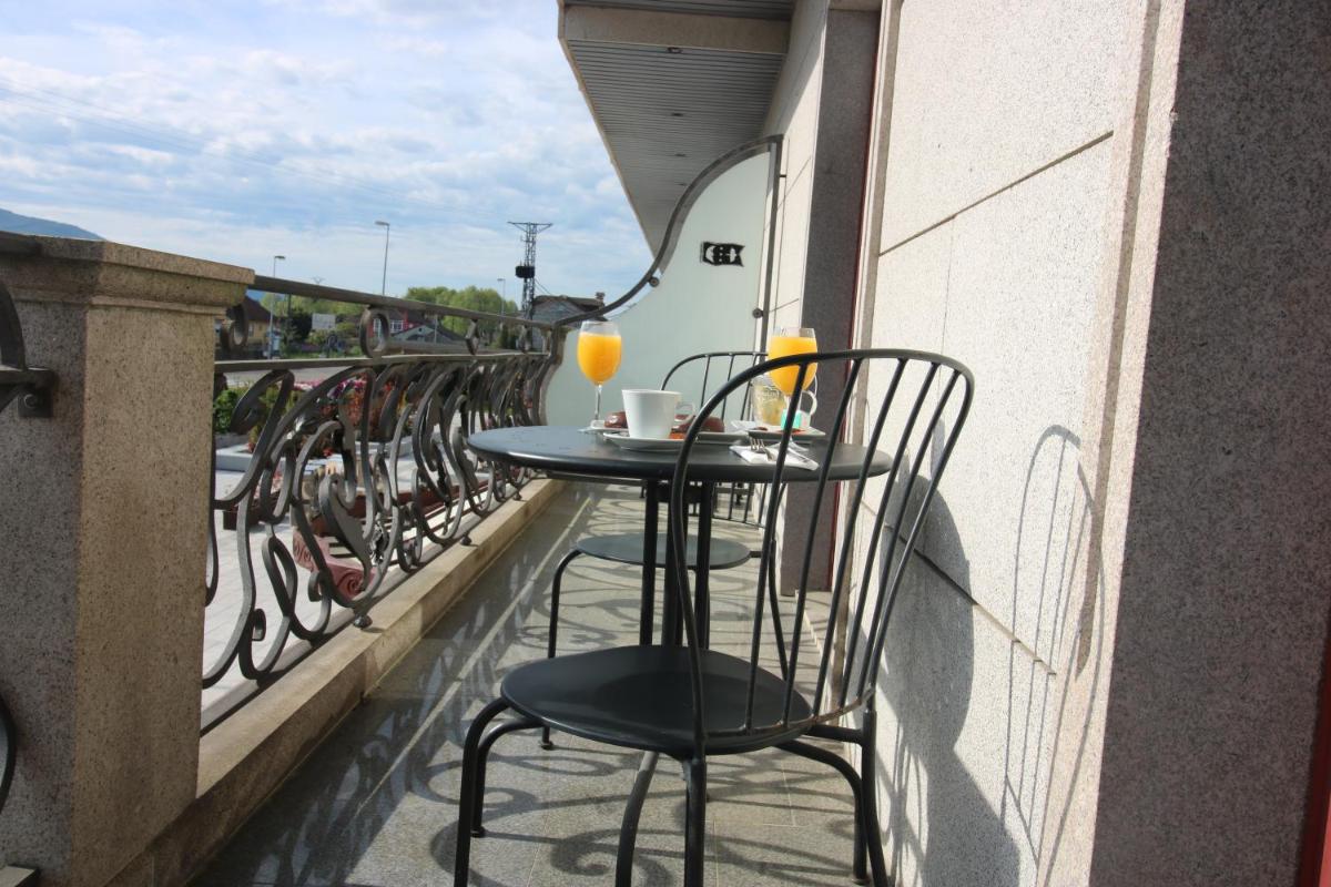 Un balcón o terraza de Hotel Alfonso I