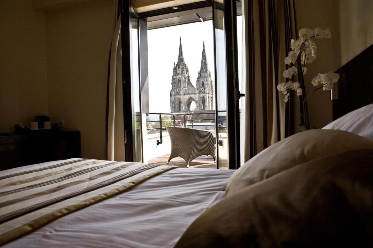 Un ou plusieurs lits dans un hébergement de l'établissement Best Western Plus Hotel des Francs