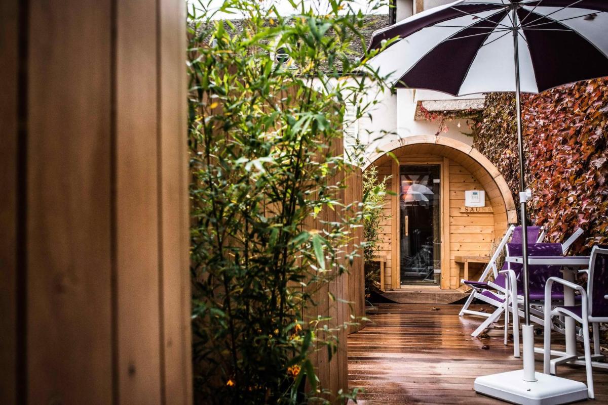 Jardin de l'établissement Hôtel Le Cep & Spa