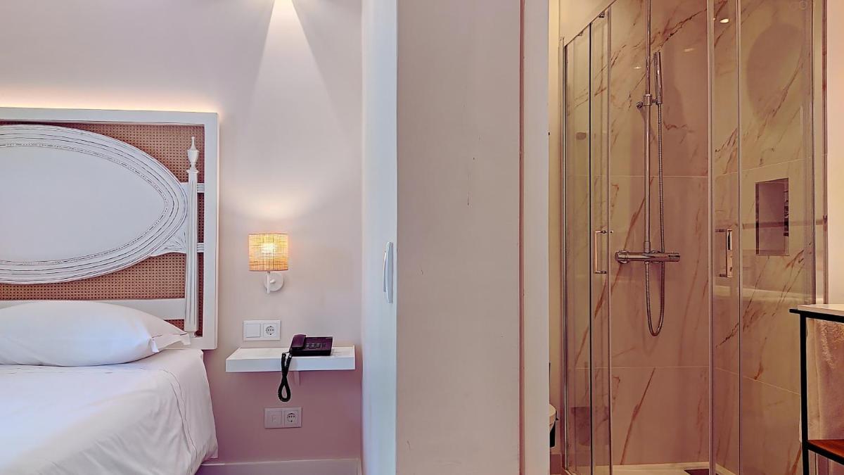 Uma cama ou camas num quarto em Grande Hotel das Caldas da Felgueira