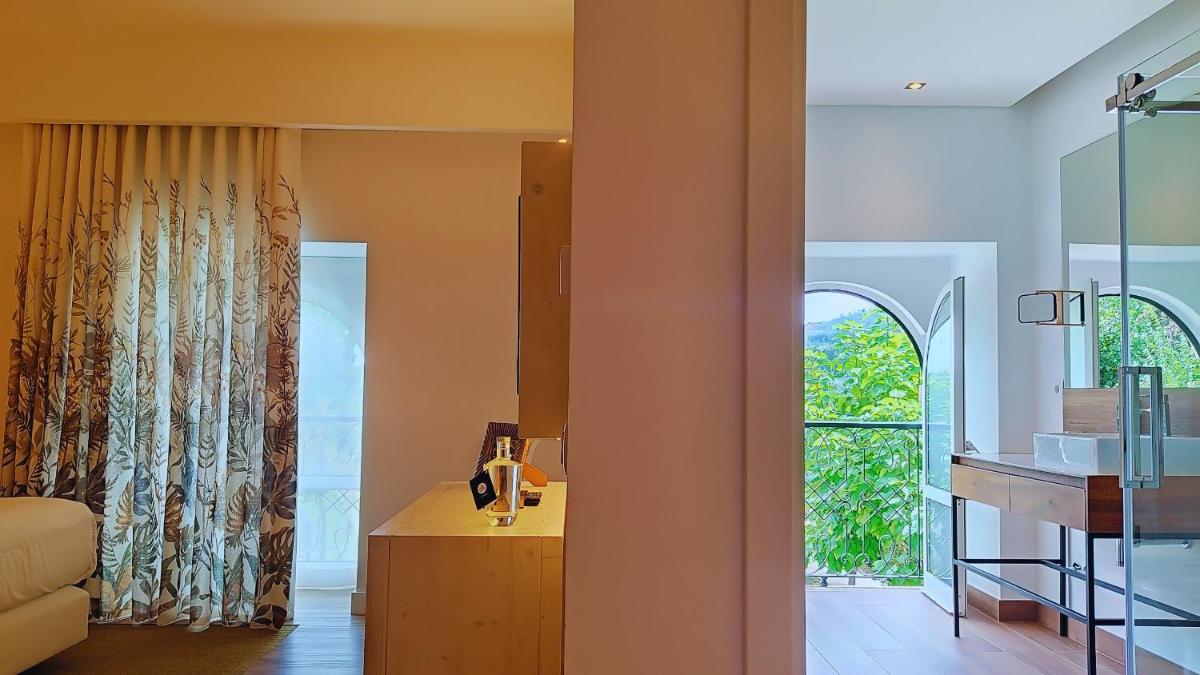 Uma cama ou camas num quarto em Grande Hotel das Caldas da Felgueira