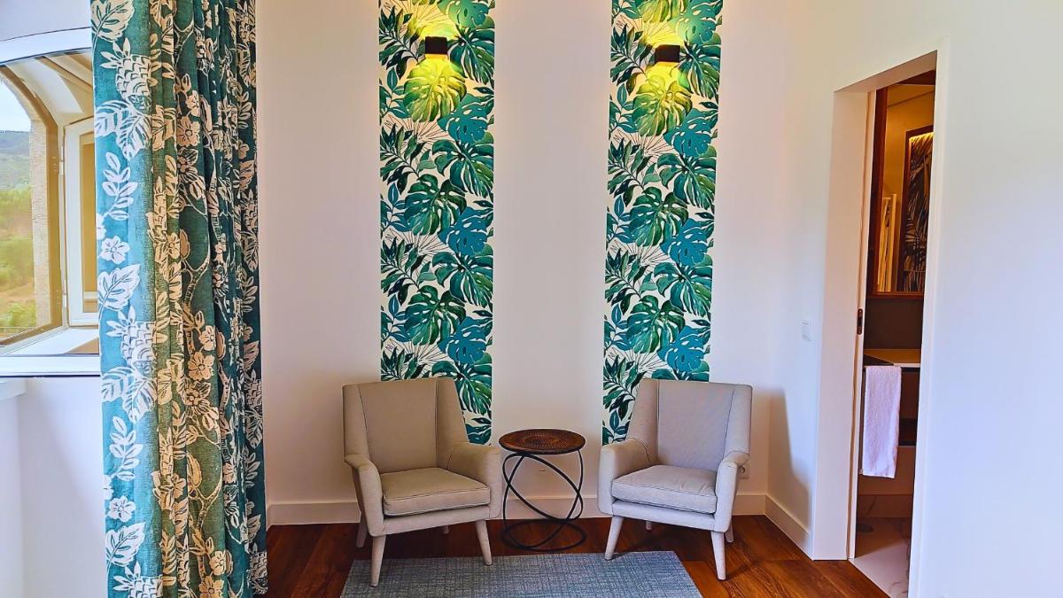Uma área de estar em Grande Hotel das Caldas da Felgueira