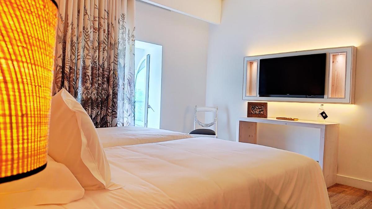 Uma televisão e/ou sistema de entretenimento em Grande Hotel das Caldas da Felgueira